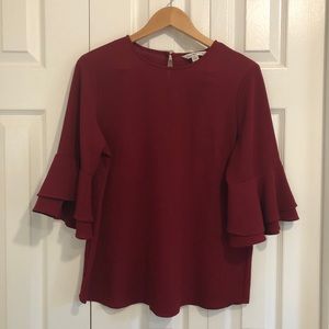 Red blouse with layered bell sleeves
